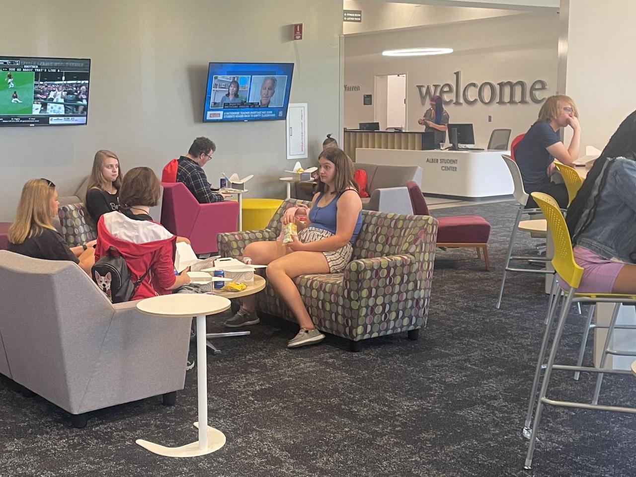 group of students seated in student center