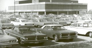 photo from 1968, full parking lot outside of Morrill Hall