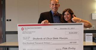 Pete Dully and Cathy Gerber with $100,000 check from Pete Dully to Students of Ohio State Marion