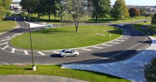 car going through the roundabout at the front of the Marion Campus