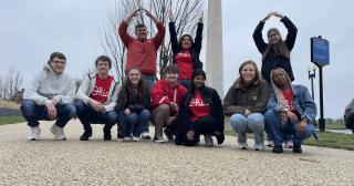 Students forming O-H-I-O in front of Washington Monument
