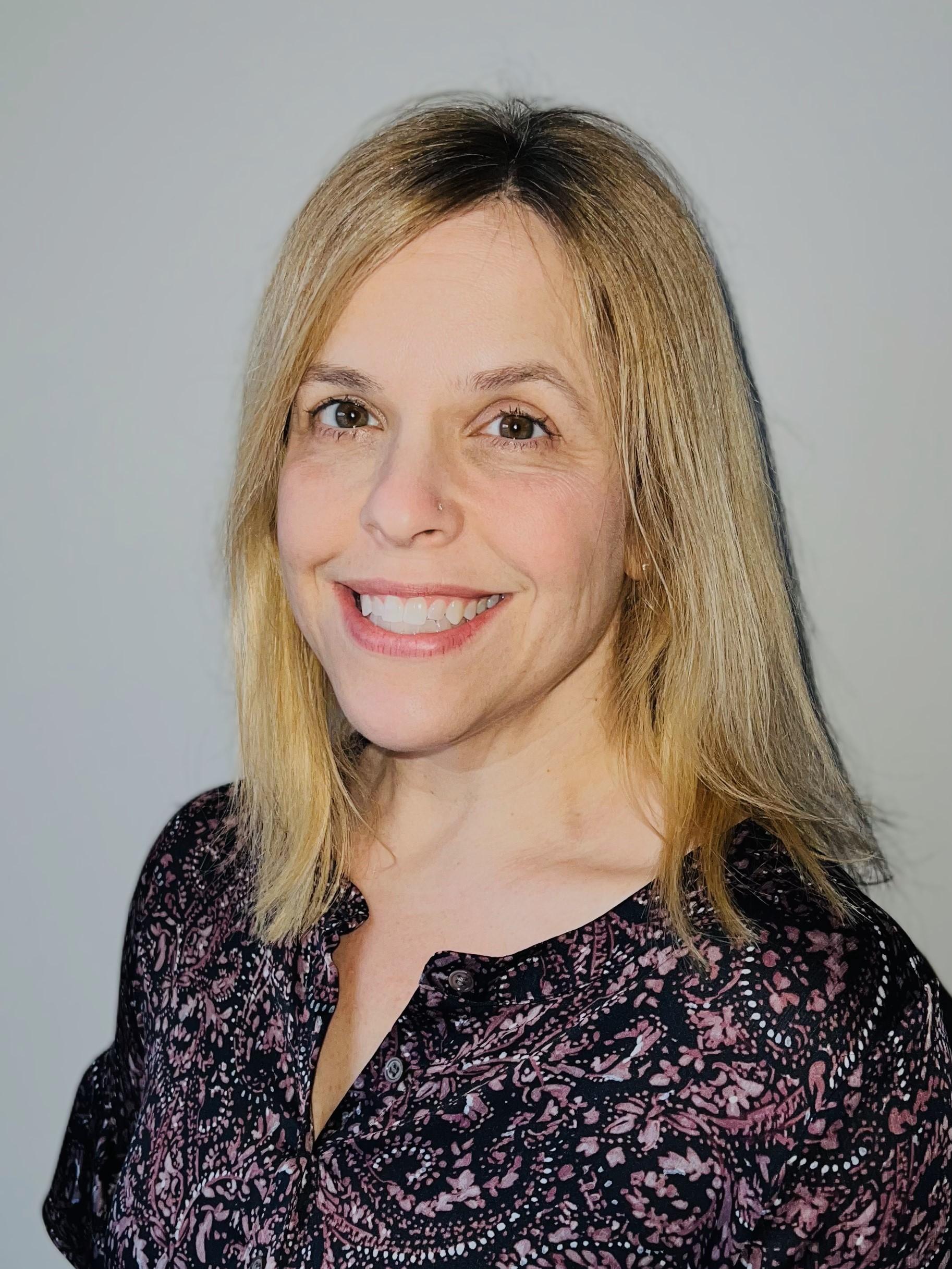 woman in floral print blouse