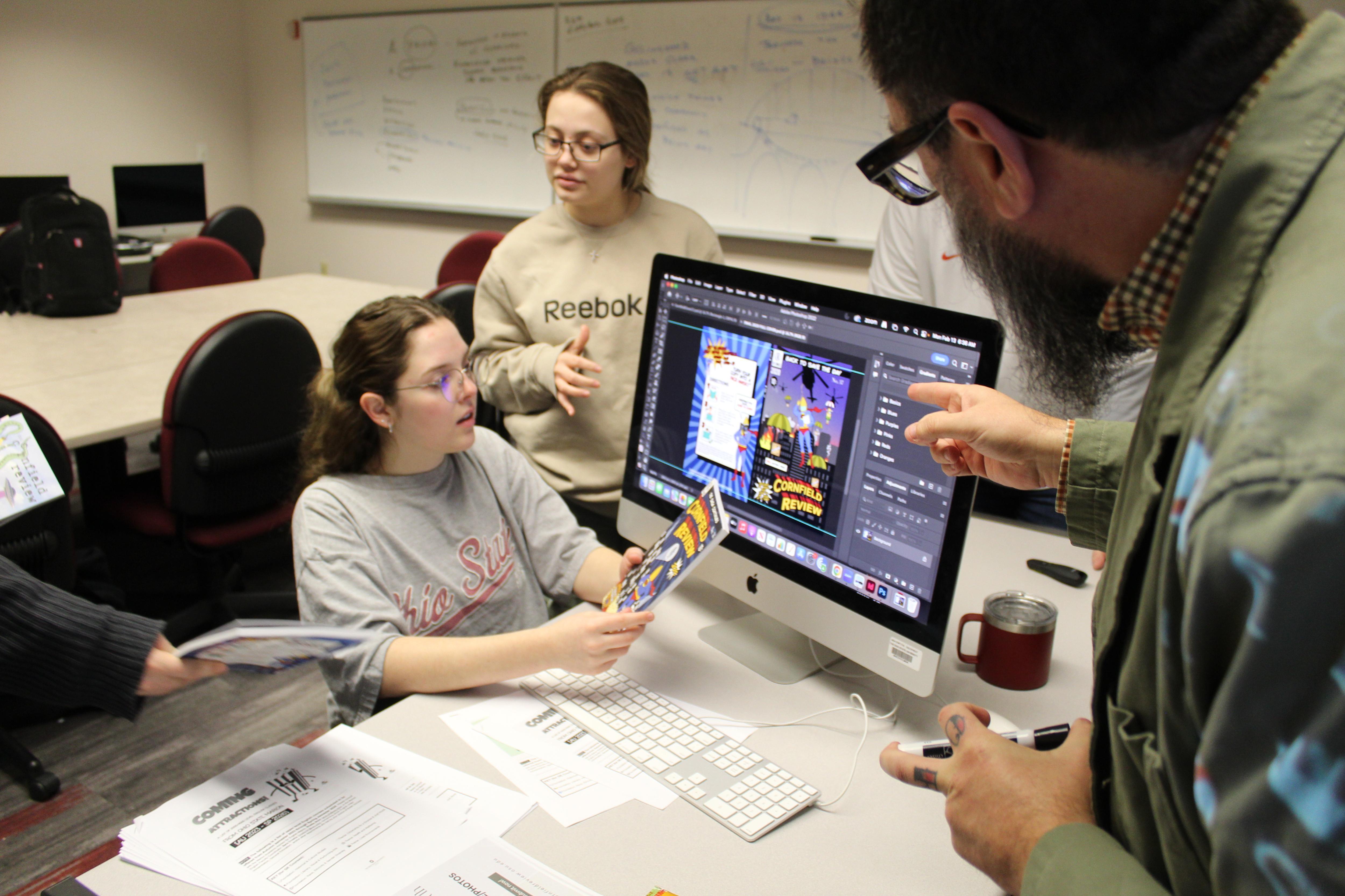 English students discuss the design of the cornfield review