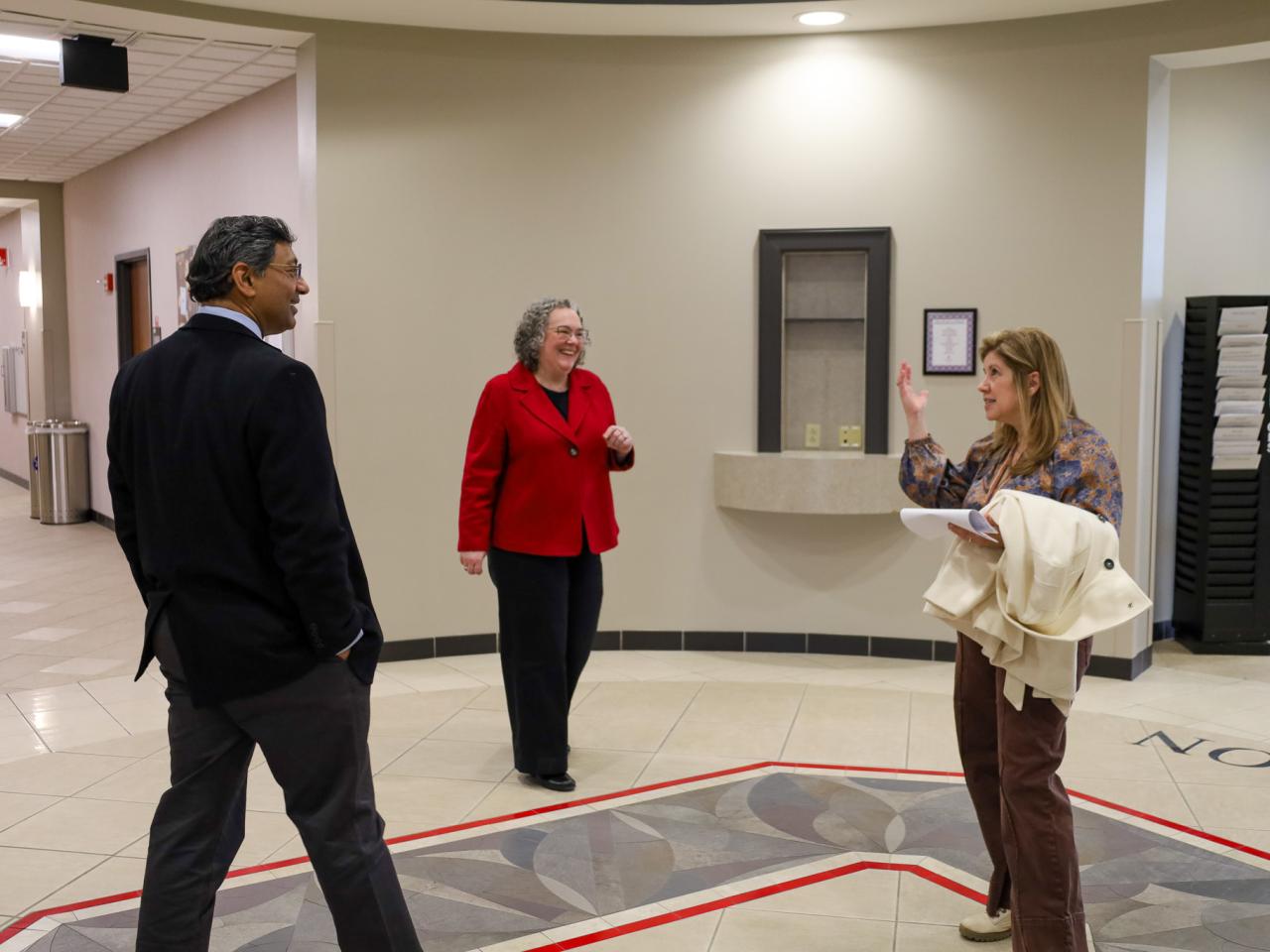 Ohio State Provost tours campus buildings with small group of people