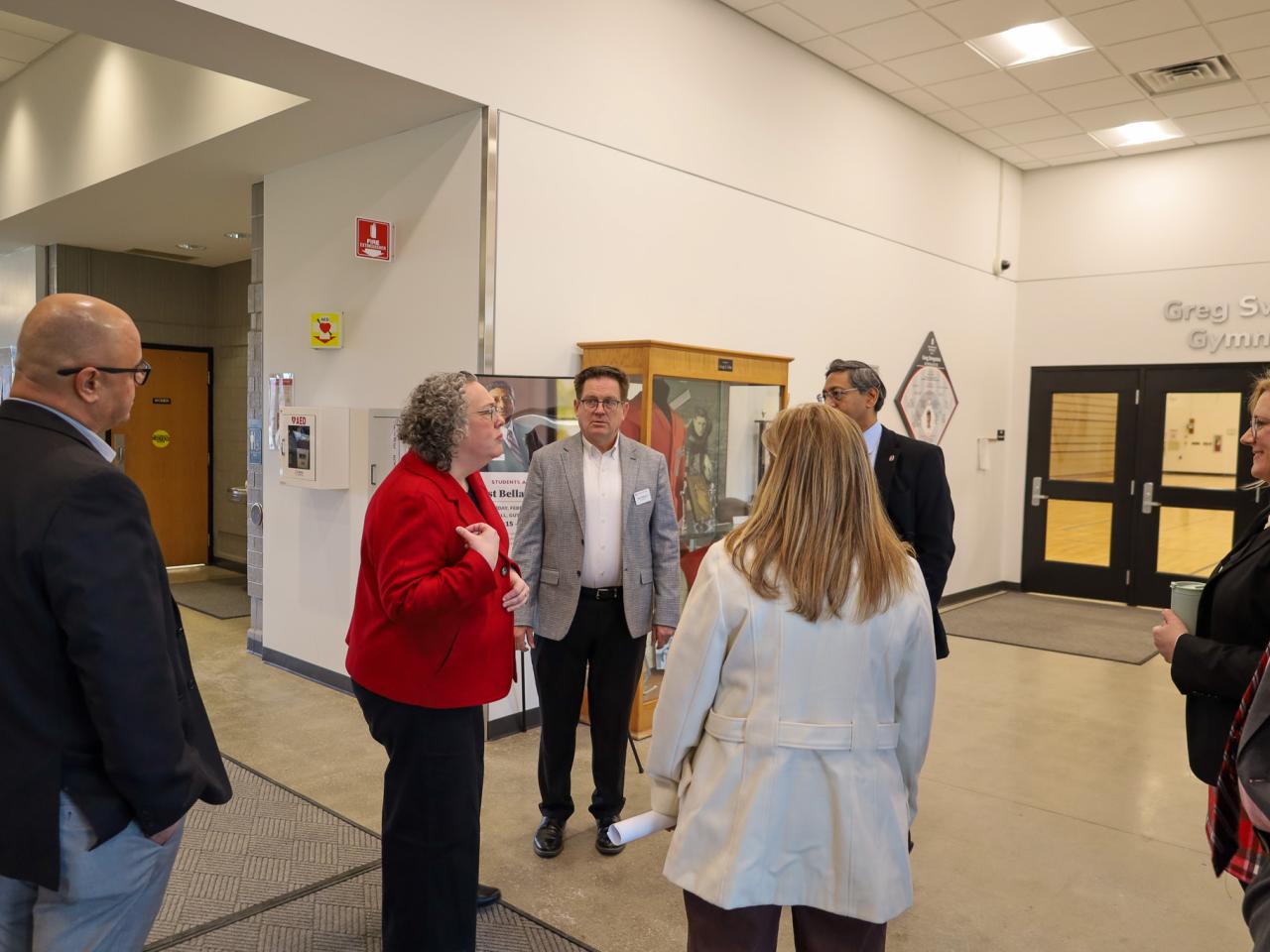 Ohio State Provost tours campus buildings with small group of people
