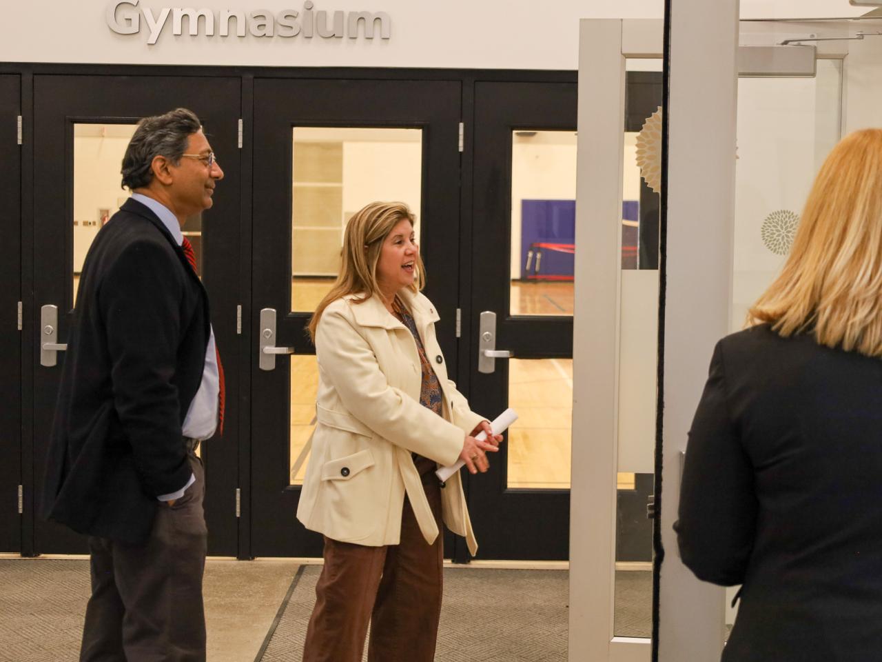 Ohio State Provost tours campus buildings with small group of people