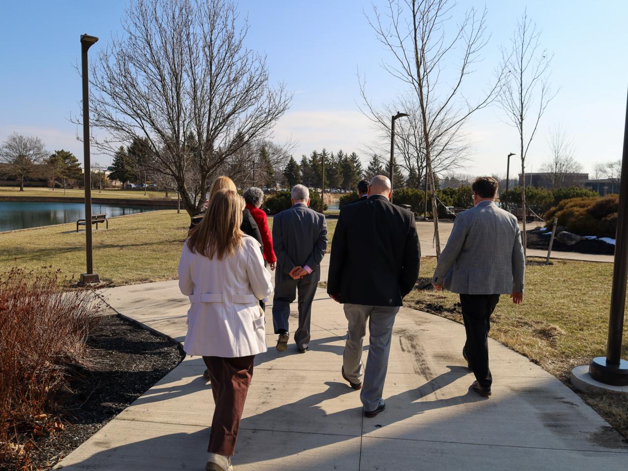 Ohio State Provost tours campus buildings with small group of people