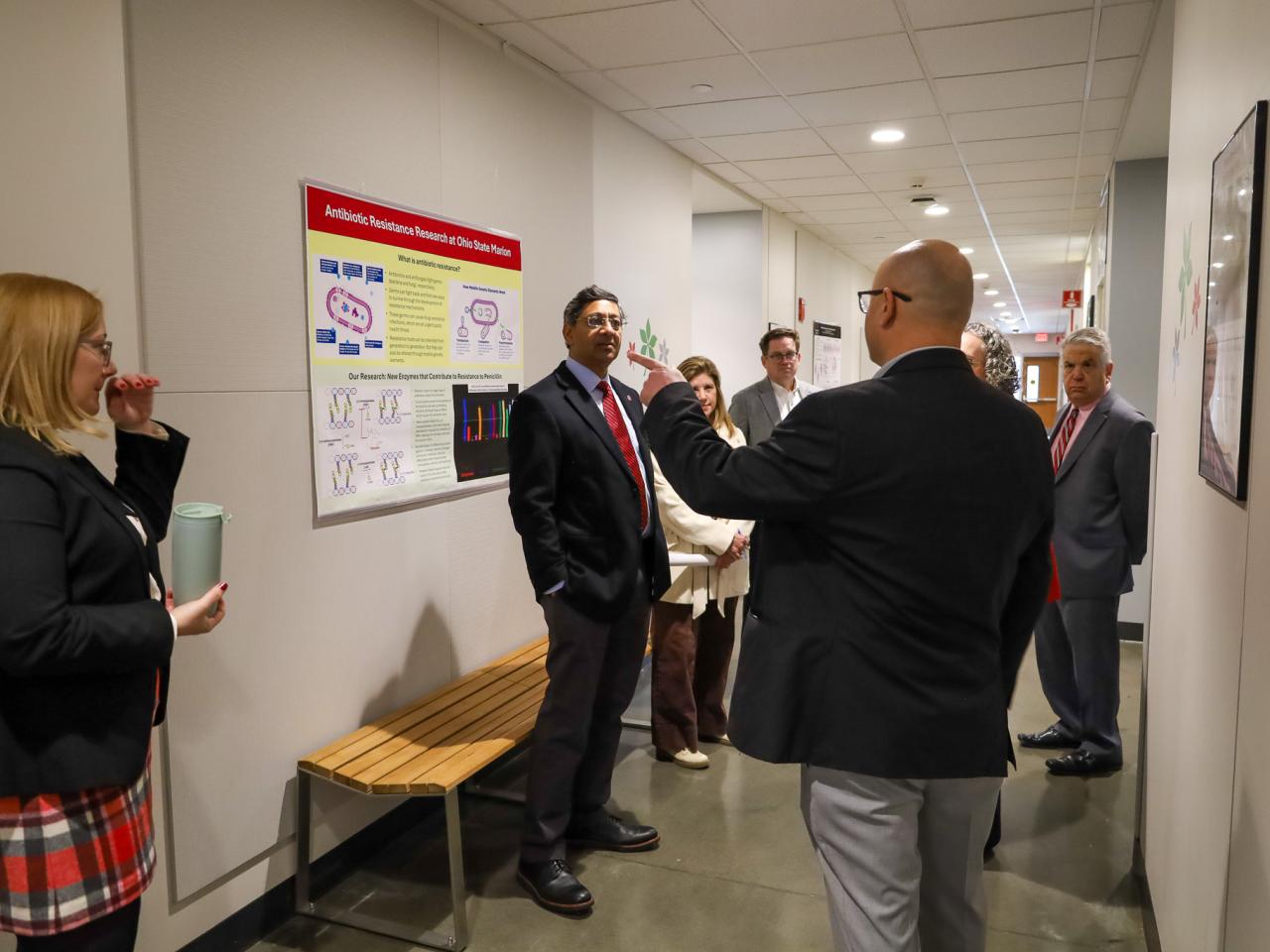 Ohio State Provost tours campus buildings with small group of people