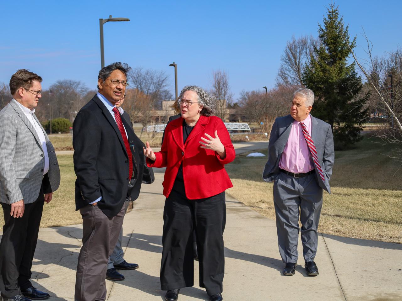 Ohio State Provost tours campus buildings with small group of people
