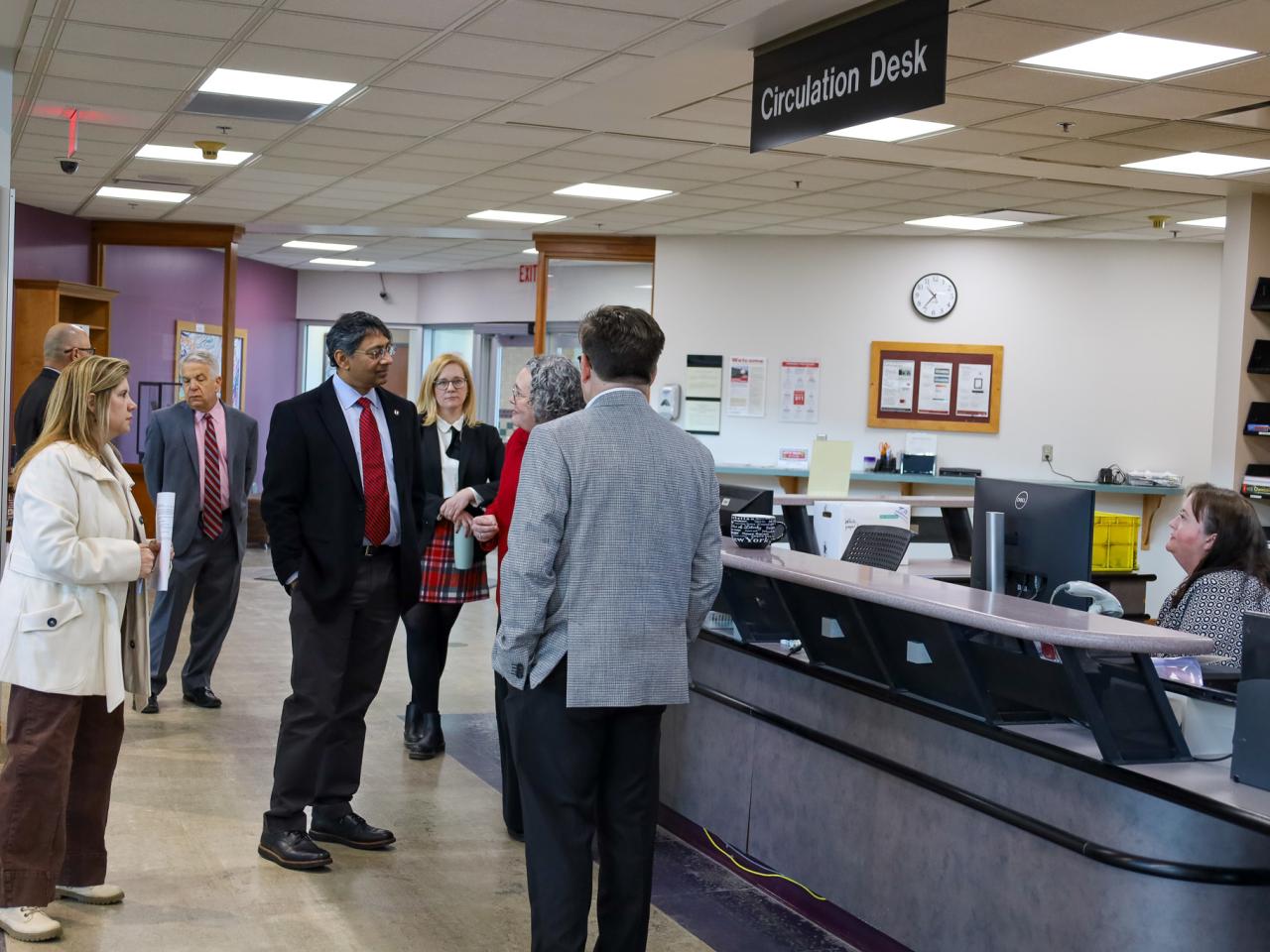 Ohio State Provost tours campus buildings with small group of people