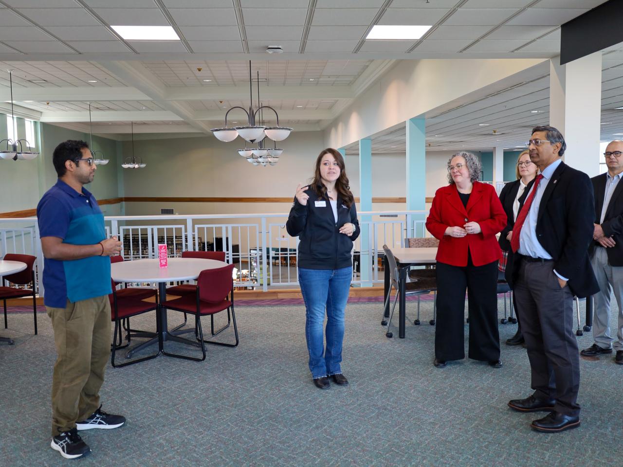 Ohio State Provost tours campus buildings with small group of people