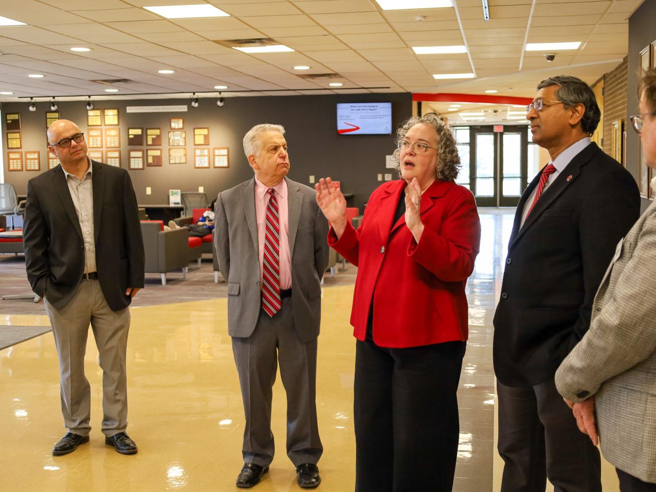 Ohio State Provost tours campus buildings with small group of people
