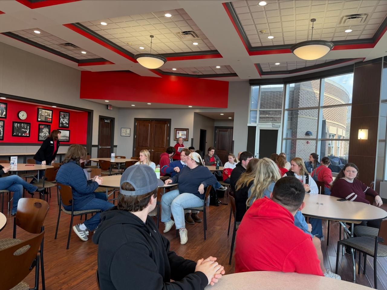 Ohio State Provost tours campus buildings with small group of people