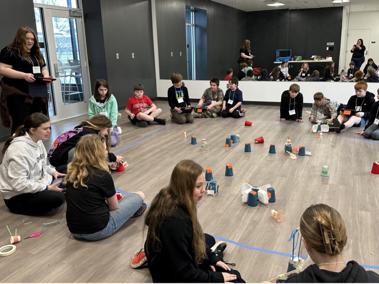 students doing rolling in robotics