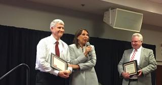 Dean of The Ohio State University at Marion, Dr. Gregory Rose, being presented the 2018 Wellness Leadership Award.  Award is presented by Vice President for Health Promotion and Chief Wellness Officer, Bernadette Melnyk 