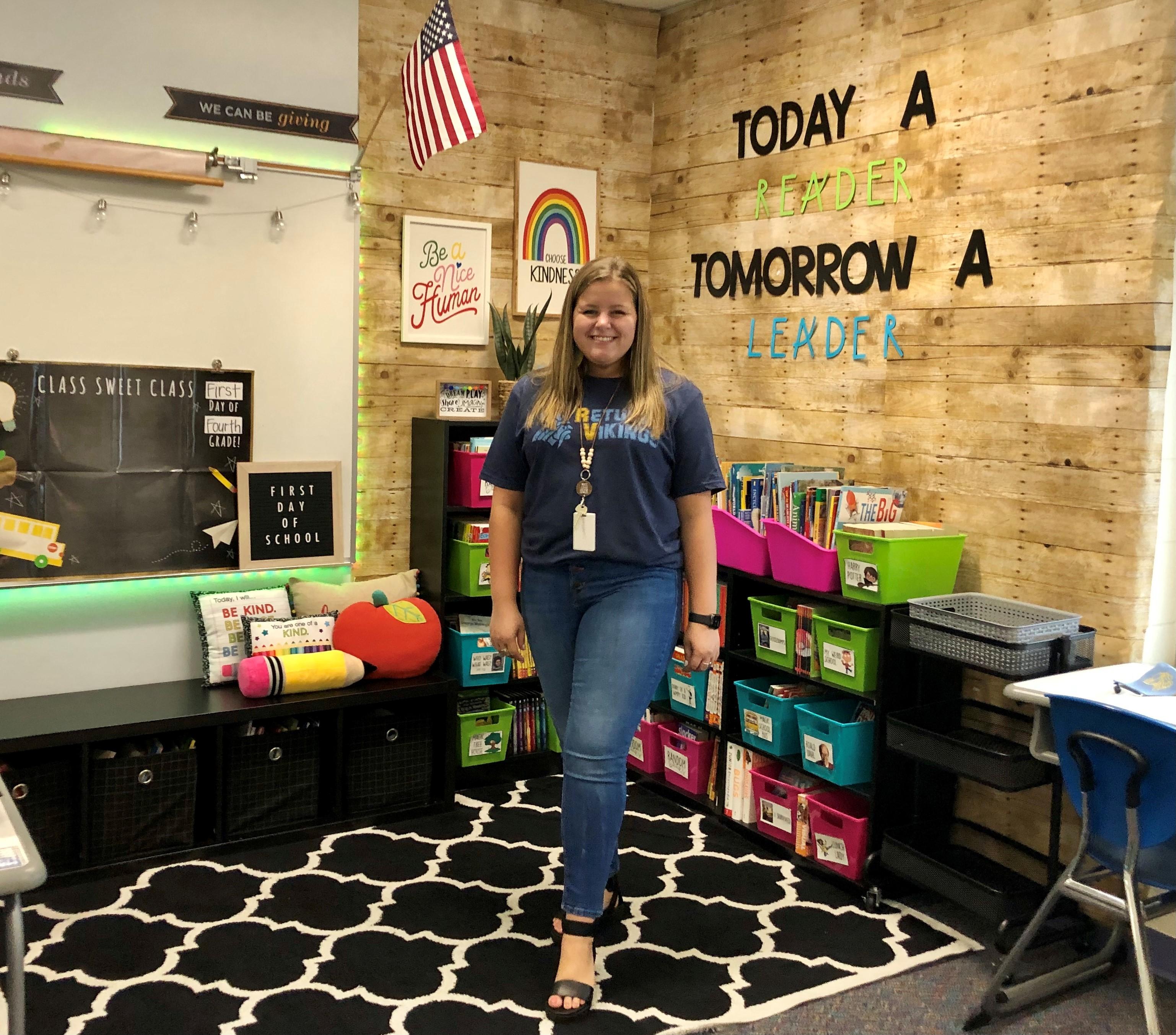 Brittany Lower posing for photo in her classroom
