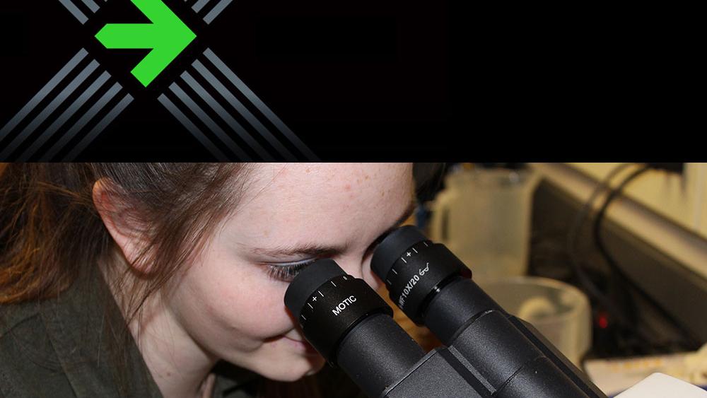 Bailey Lucas looking into Motic scientific microscope with Pelotonia logo edited into picture above her