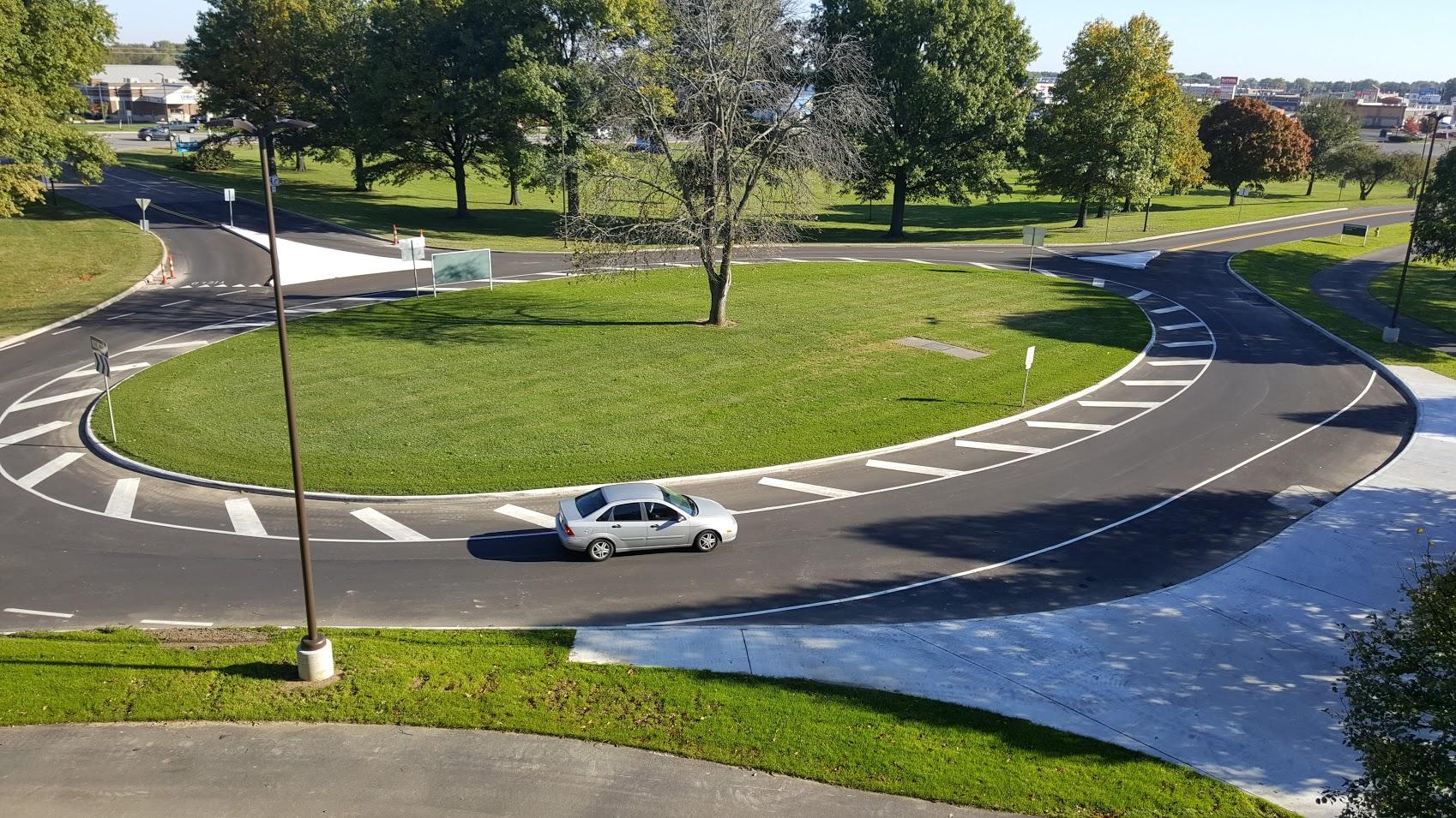 car going through the roundabout at the front of the Marion Campus