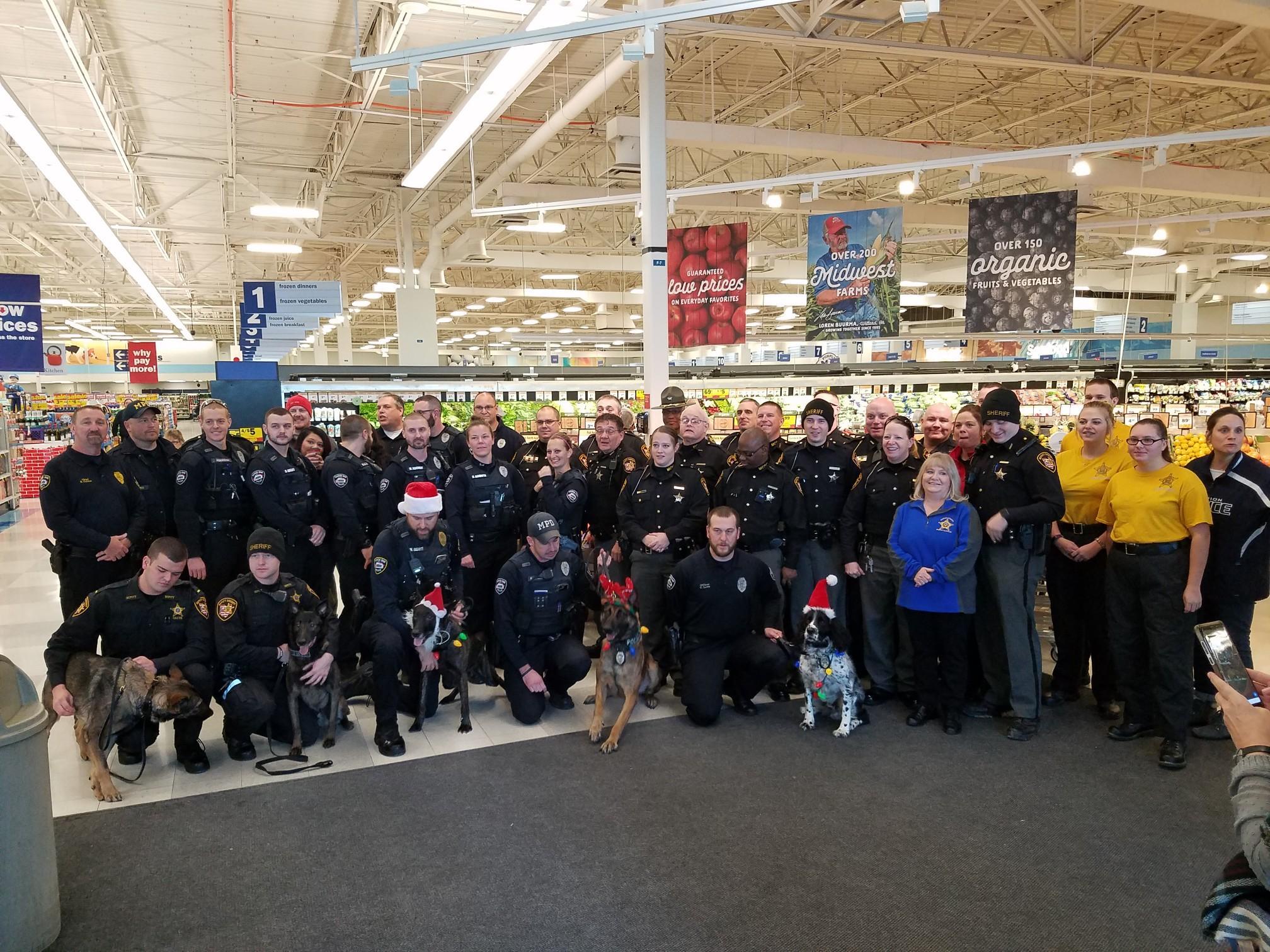  Marion area law enforcement at Meijer in Marion, Ohio and other Marion area law enforcement as part of Marion County’s FOP Cops and Kids event