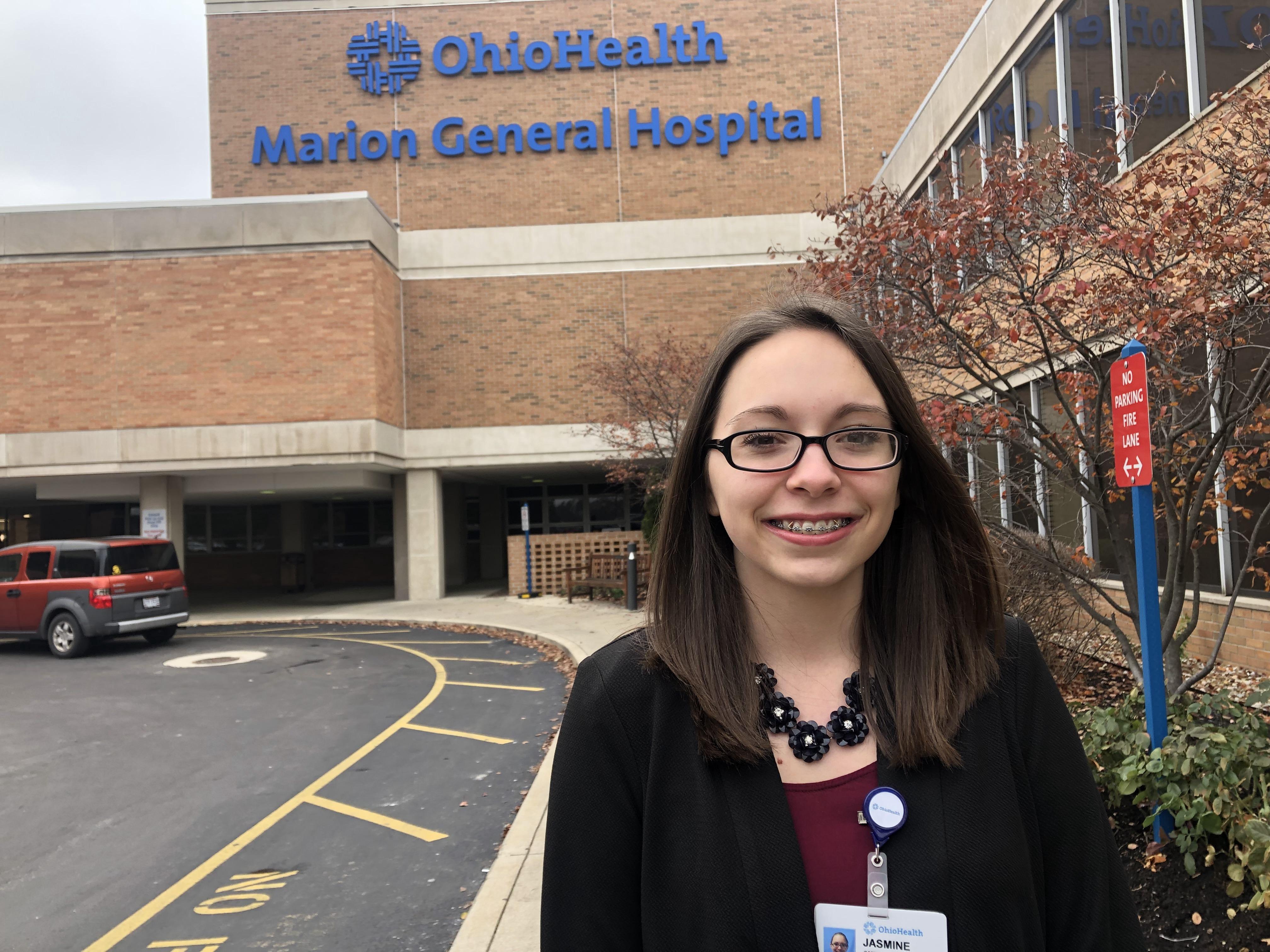 Marion native and Ohio State Marion student Jasmine Gaffney pictured in front of Ohio Health Marion General Hospital