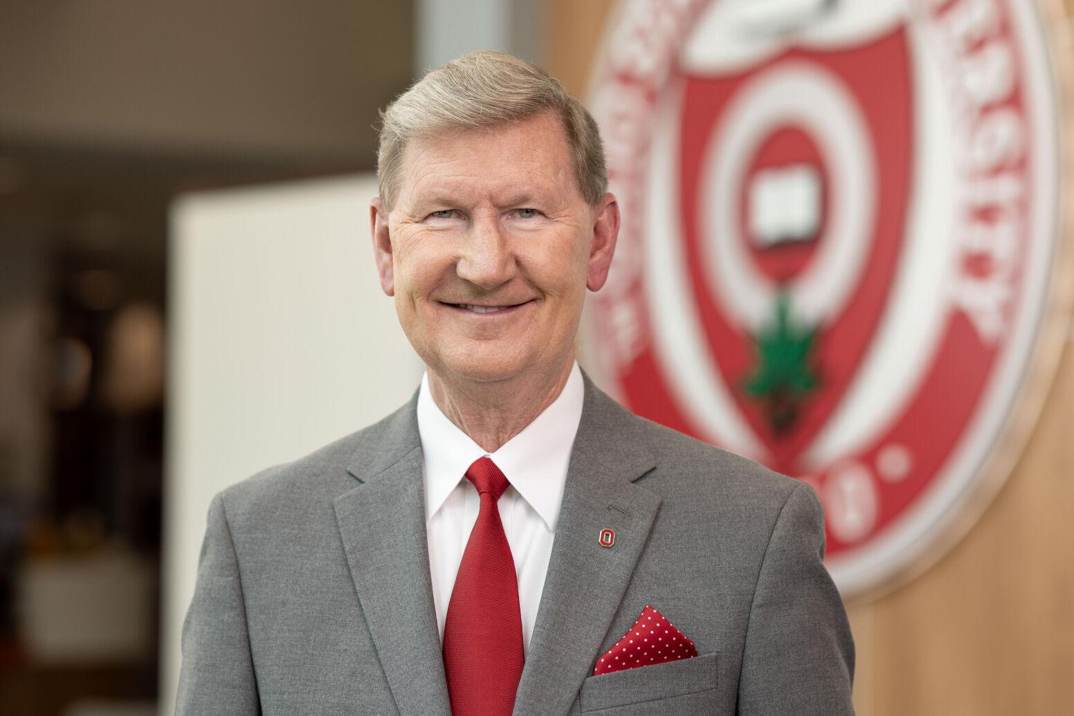 Ohio State University President Ted Carter in front of university seal