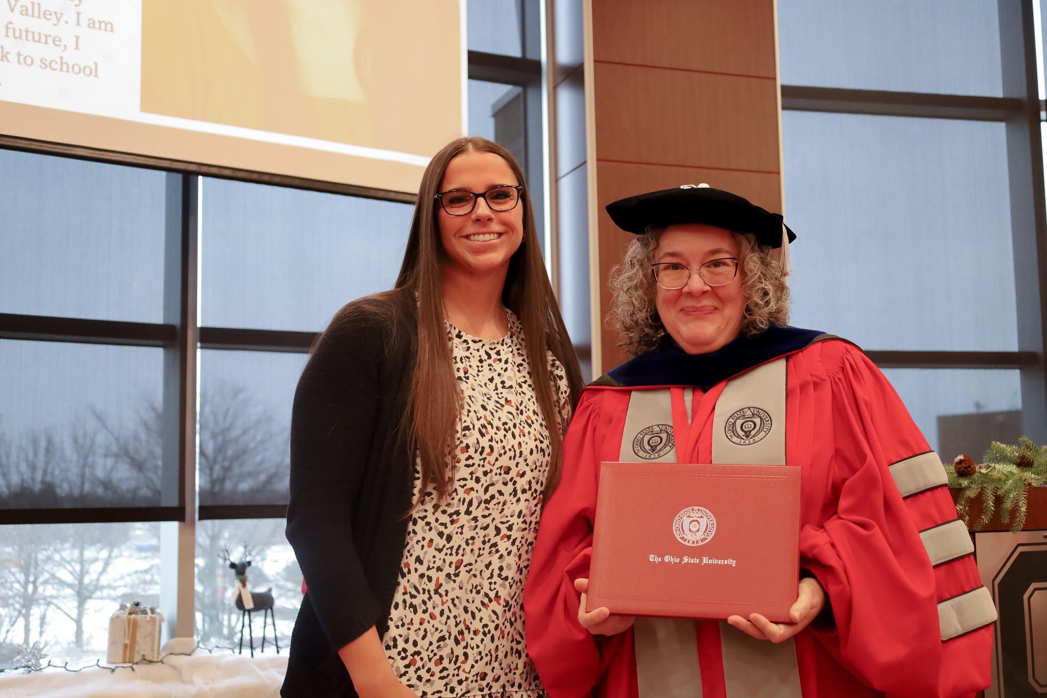 woman presented diploma