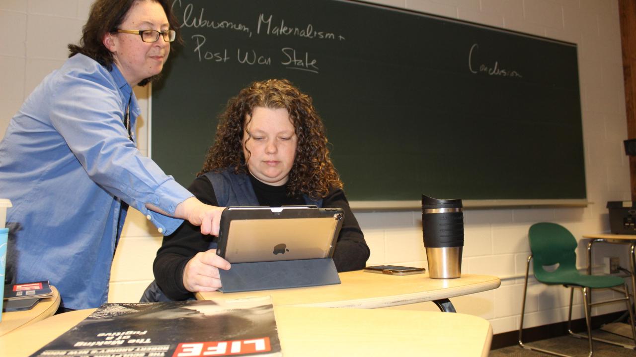 professor sumner with a student