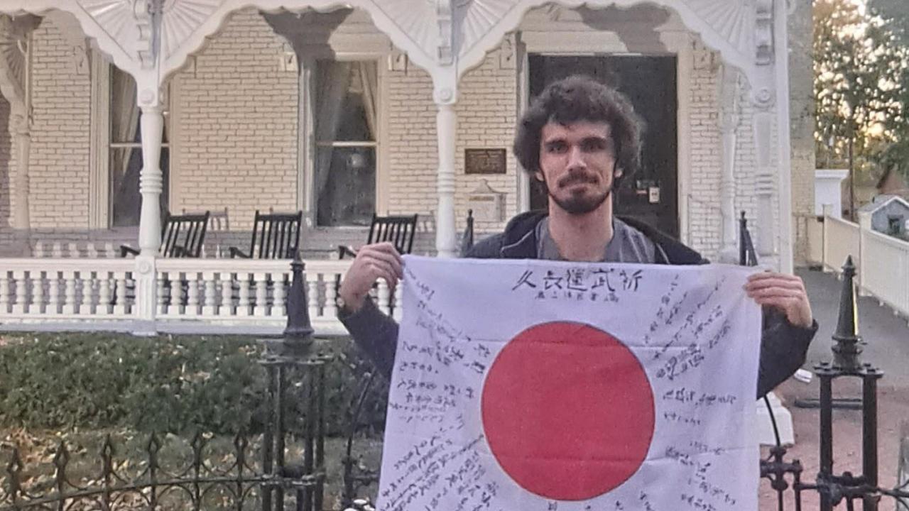 man holding flag