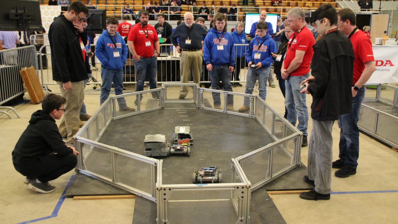 high school students competing in a robotics competetion