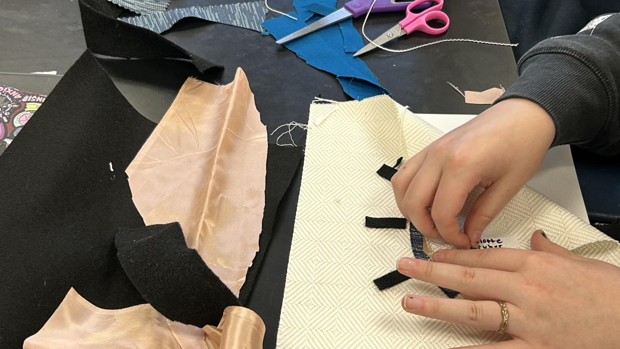 a student doing crafts
